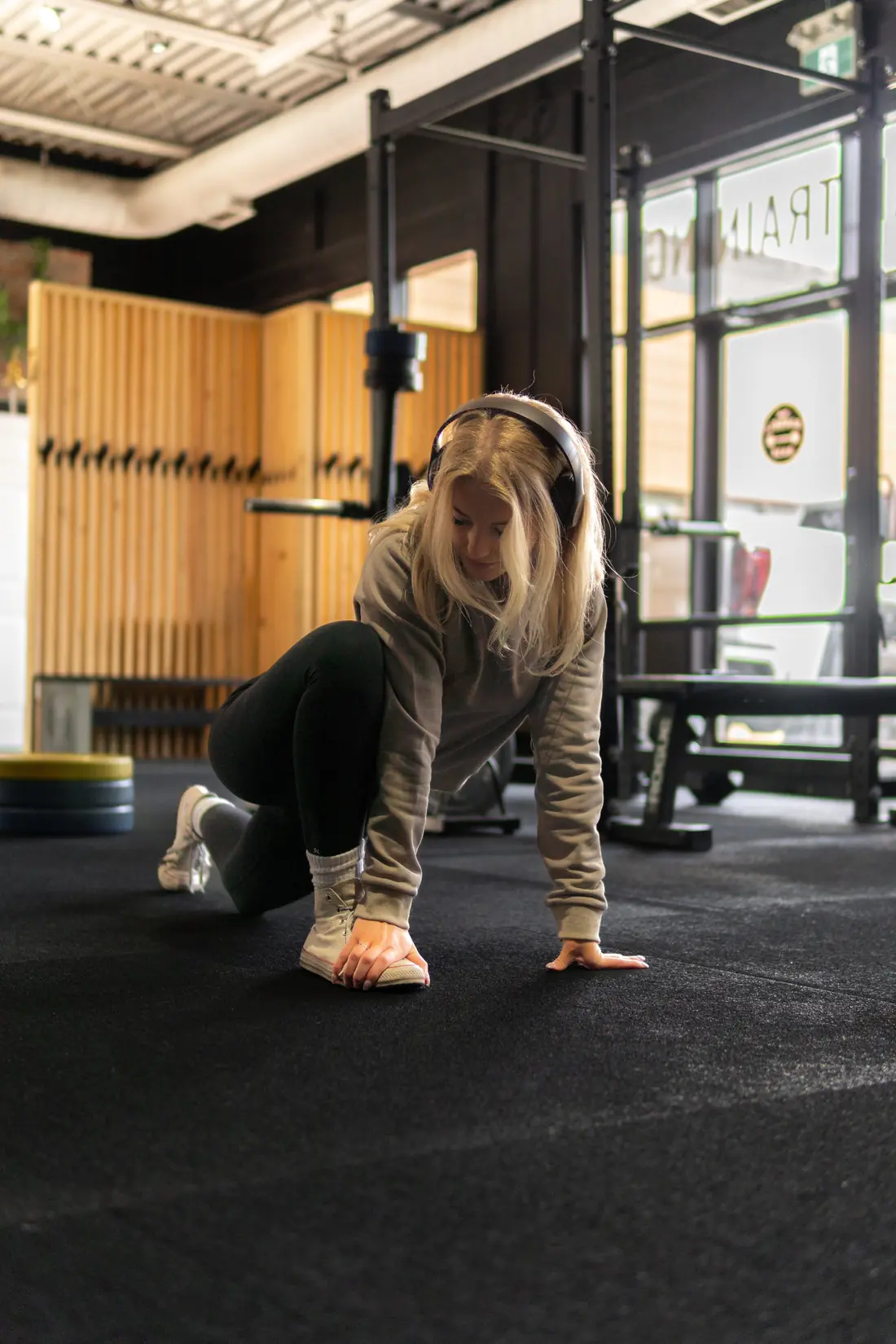 Slow, controlled mobility work on the gym floor